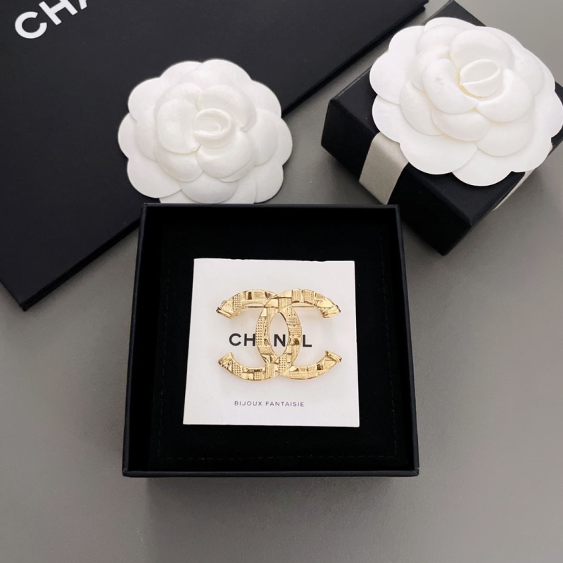 Ch**el brooches